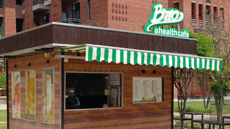 The BRIO kiosk at PSIT with a green striped awning