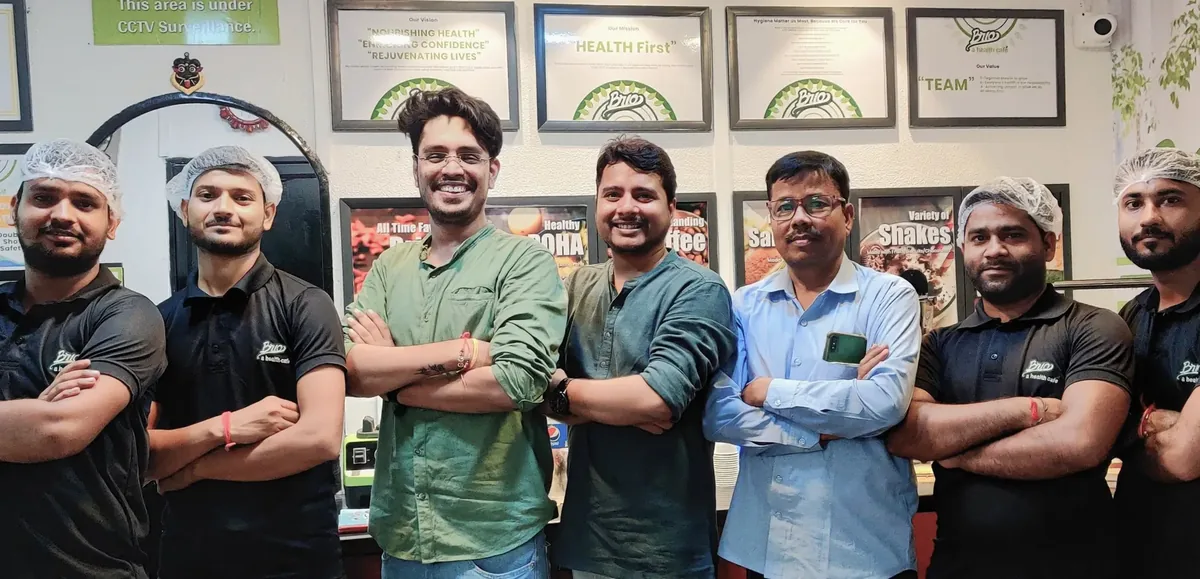 The BRIO team standing together behind the counter