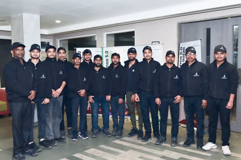 The BRIO team in matching black jackets